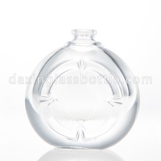 Botella de perfume vacía de forma redonda plana de vidrio de alta calidad con bomba de pulverización