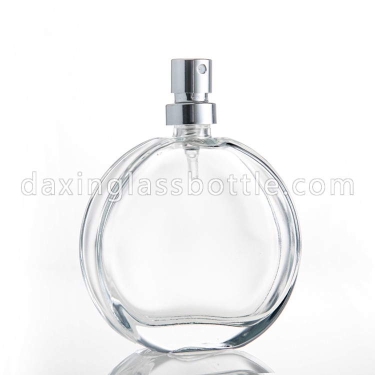 스프레이 뚜껑이 있는 납작하고 둥근 50ml 소형 유리 향수병