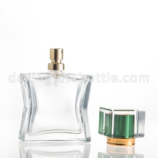 Fancy 55ml Curve Shape Glass Perfume Bottle For Sale With Spray Lid