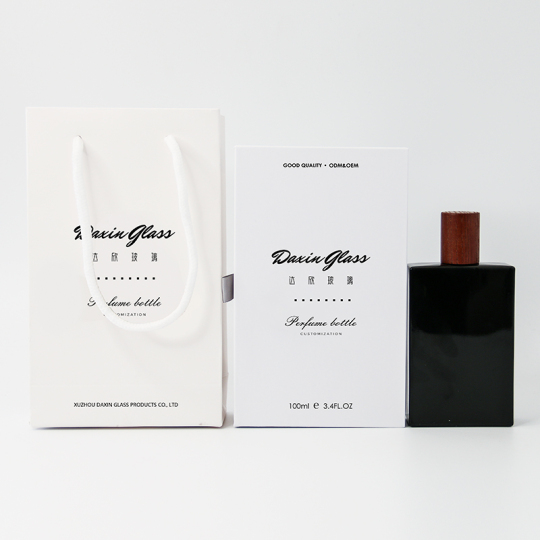 زجاجة عطر 100 مل مع علبة تغليف وحقيبة ورقية محمولة