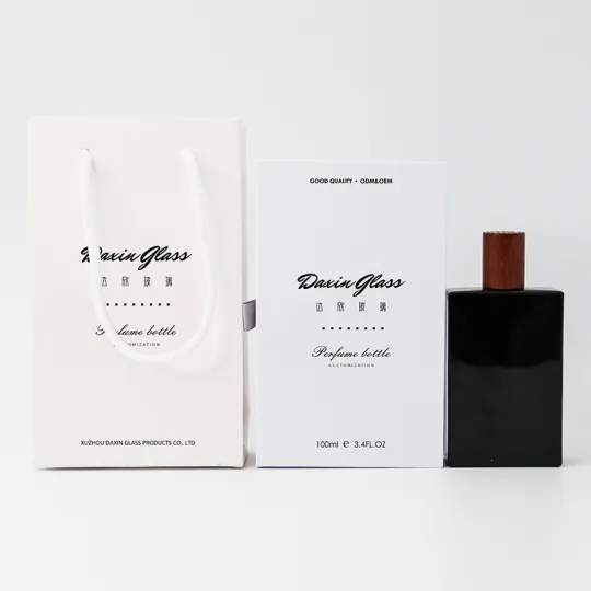 Botella de vidrio de perfume de 100 ml con caja de embalaje y bolsa de papel de mano