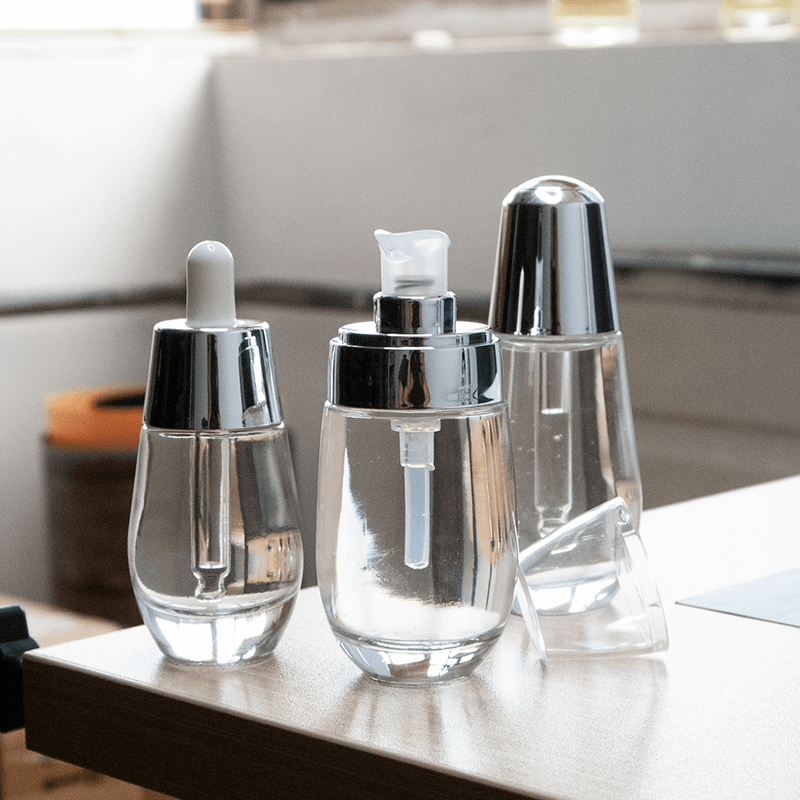 Frascos de vidrio para sérum facial cosmético, frascos de lujo personalizados vacíos con gotero para aceites esenciales capilares.