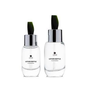 Flacone in vetro per essenza cosmetica facciale da 50 ml per la cura della pelle con bastoncino a spatola