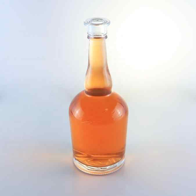 Botella de tequila de cuello largo y fondo redondo de buena calidad