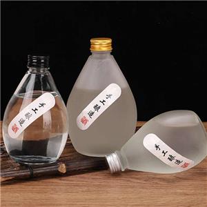 Hot Selling Unique Glass Juice Bottle Beverage Bottle With Lids