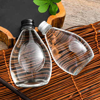Hot Selling Unique Glass Juice Bottle Beverage Bottle With Lids