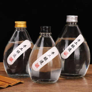 Hot Selling Unique Glass Juice Bottle Beverage Bottle With Lids