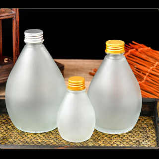 Hot Selling Unique Glass Juice Bottle Beverage Bottle With Lids