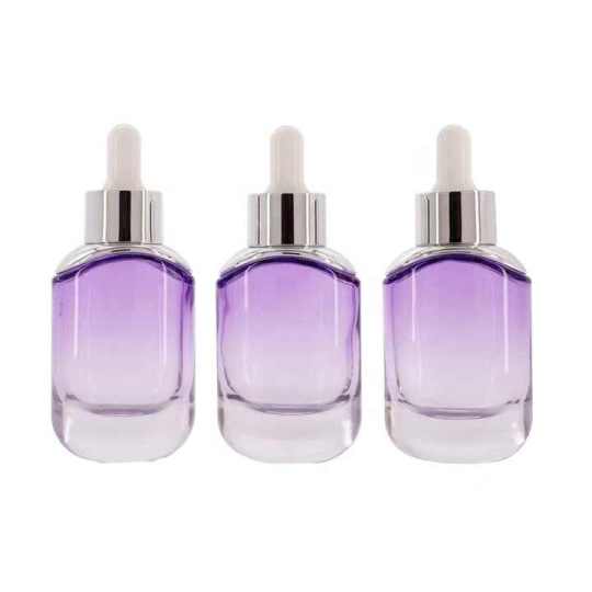 Proveedores de envases cosméticos al por mayor de 30 ml Botella cuentagotas de vidrio para aceite esencial con hombro plateado
