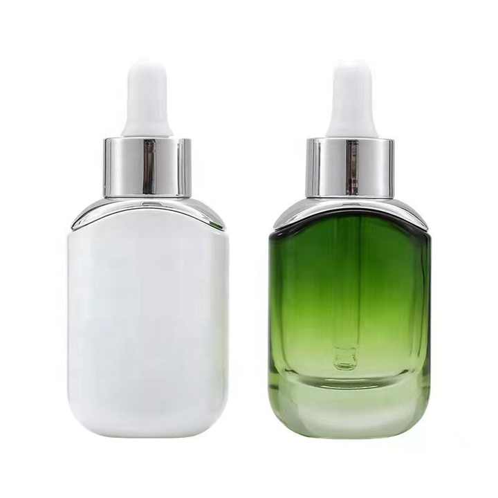 Pemasok Kemasan Kosmetik Grosir 30ml Botol Pipet Kaca Minyak Esensial dengan Bahu Perak