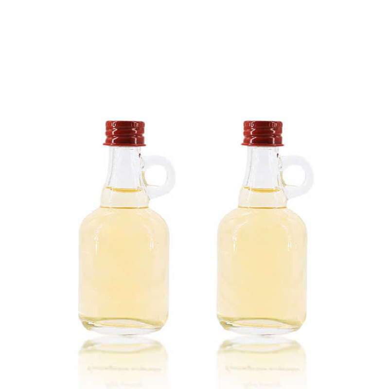Precio de fábrica, 50 ml, botellas pequeñas de vidrio de California vacías y transparentes con asa para jarabe de arce