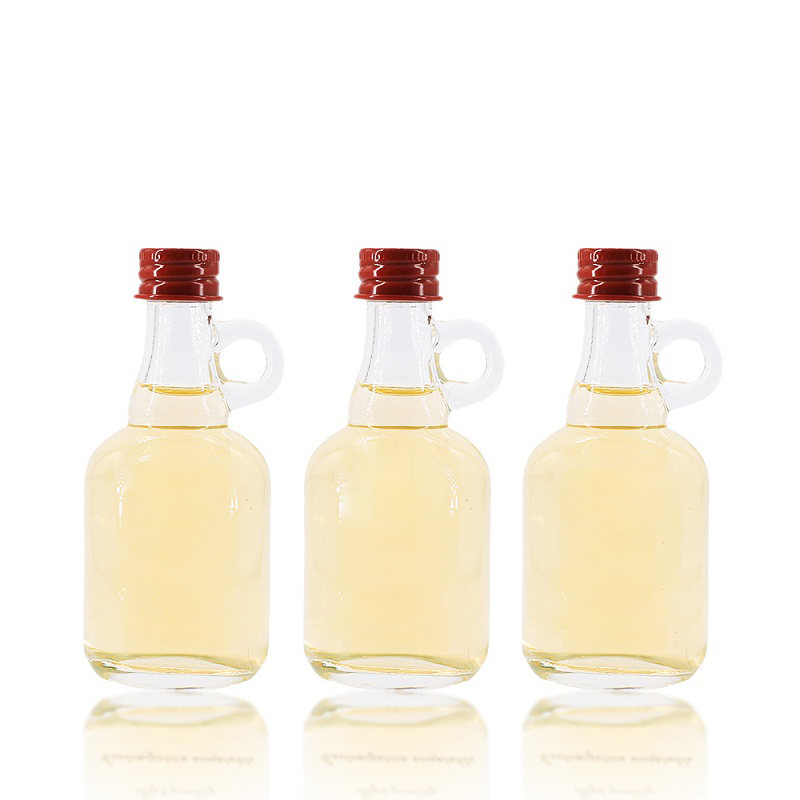 Harga Pabrik Botol Kaca Mini Kecil Bening Kosong 50ml dengan Pegangan untuk Sirup Maple