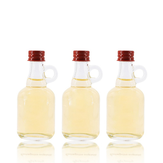 Prezzo di fabbrica 50 ml bottiglie di vetro vuote trasparenti piccole mini California con manico per sciroppo d'acero