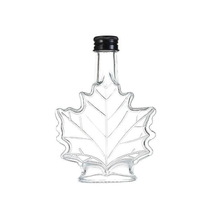 Heißer Verkauf Ahornblatt geformte Glasgetränkeflasche 50ml 100ml Glasweinflasche