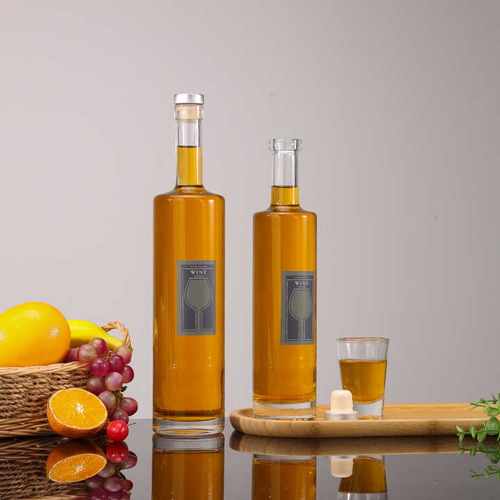 Botellas de vidrio transparentes redondas de 500 ml para vodka, hidromiel, brandy y licor con tapa de corcho.