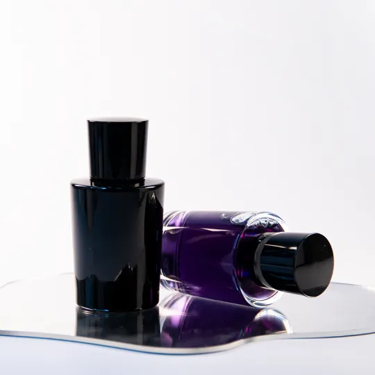 زجاجة عطر فاخرة من تصميم الشركة المصنعة للمعدات الأصلية بسعة 50 مل، زجاجة عطر سوداء فريدة من نوعها فارغة قابلة لإعادة التعبئة