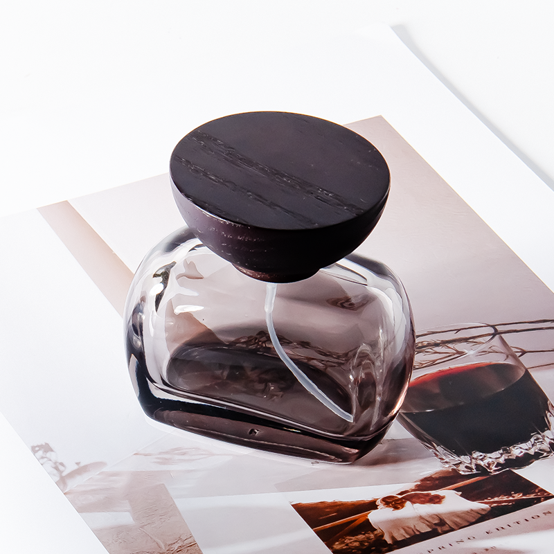 Frascos de perfume unisex únicos de 30 ml con forma de oblata transparente, 50 ml y 100 ml.