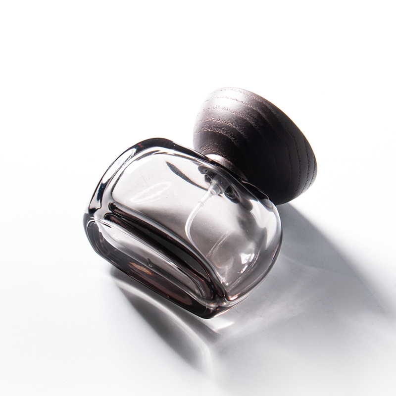 Frascos de perfume unisex únicos de 30 ml con forma de oblata transparente, 50 ml y 100 ml.