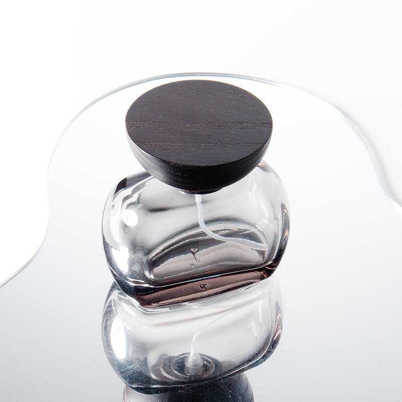 Frascos de perfume unisex únicos de 30 ml con forma de oblata transparente, 50 ml y 100 ml.