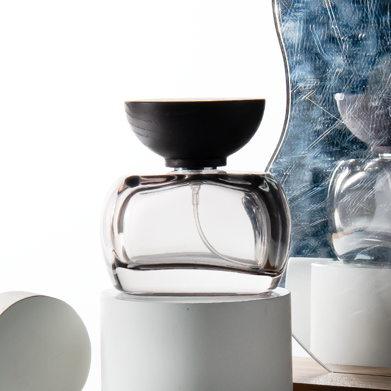 Frascos de perfume unisex únicos de 30 ml con forma de oblata transparente, 50 ml y 100 ml.