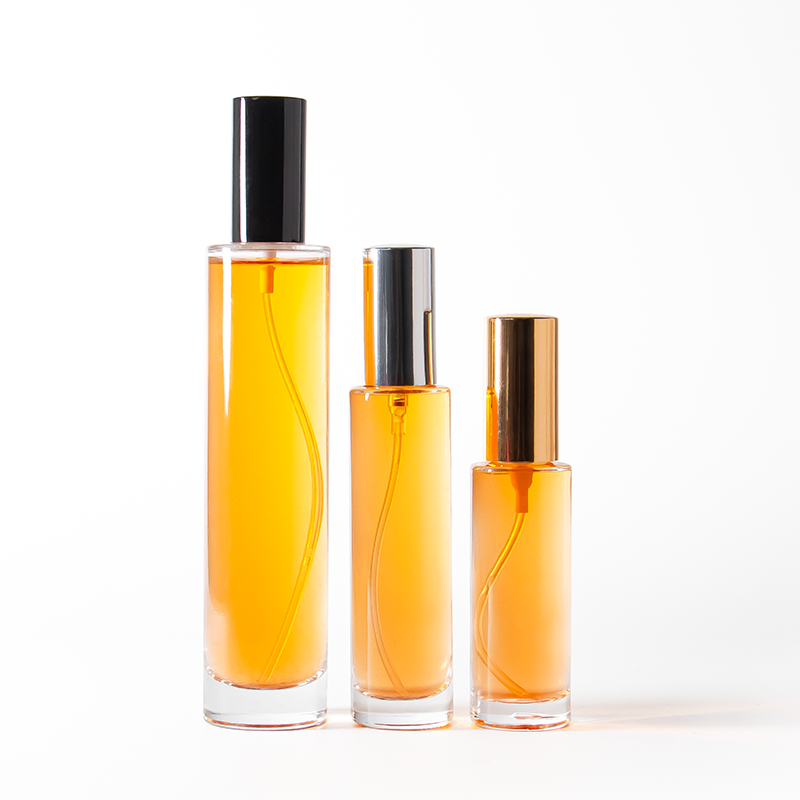 زجاجات عطر أسطوانية دائرية بتصميم مخصص، سعة 30 مل، 50 مل، 100 مل، مع غطاء ذهبي أو فضي