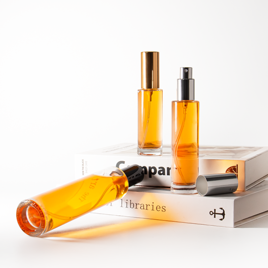 Flaconi di profumo in vetro rotondi cilindrici da 30 ml, 50 ml e 100 ml con design personalizzato e tappo in argento dorato