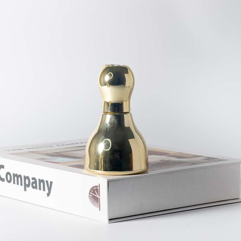 Sleek Gold-Toned Serum Bottle