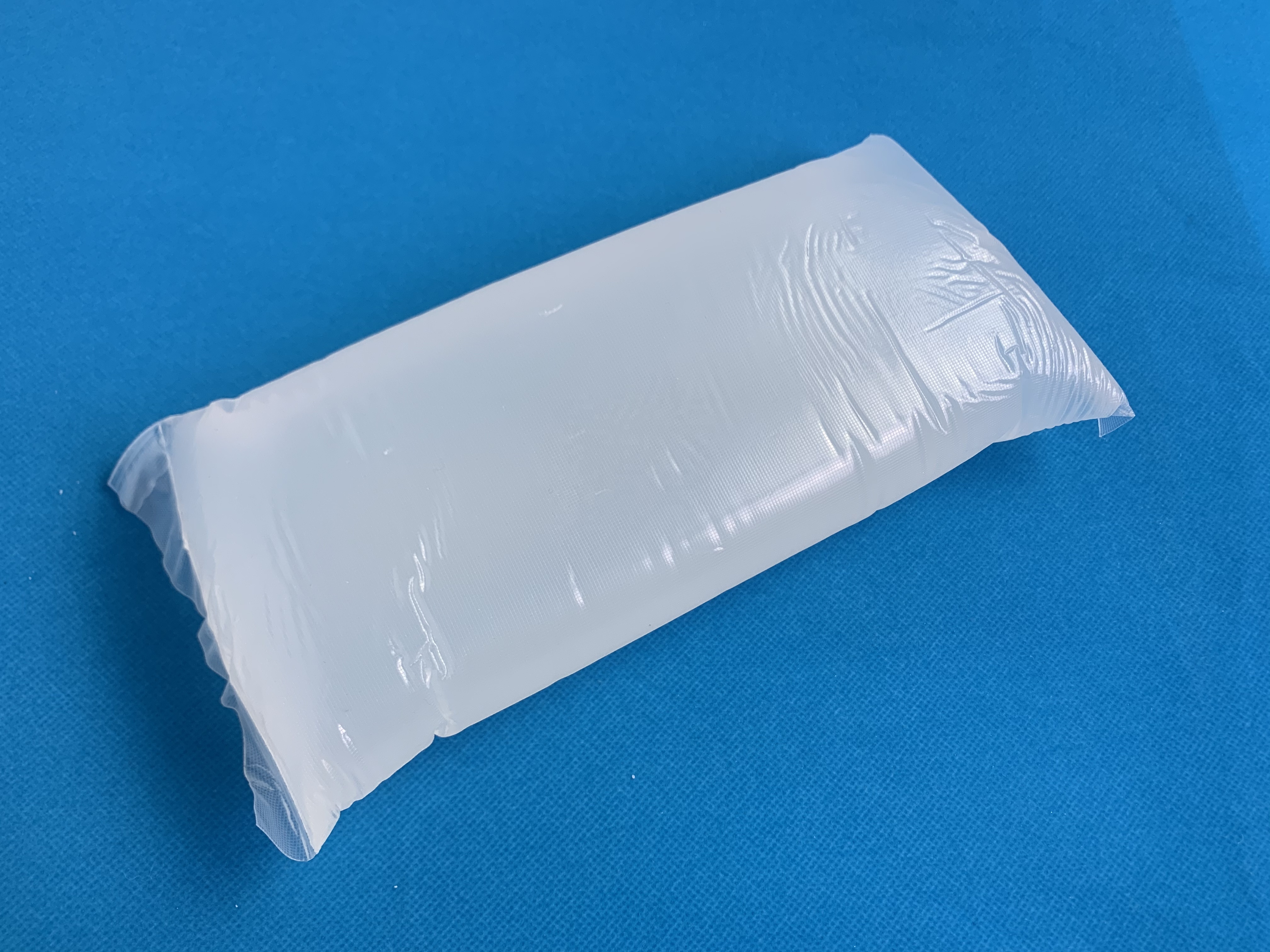 Китай Оптовая позиционирование термоплавкий клей термоплавкий чувствительный к давлению клей клей гигиеническая салфетка для детских подгузников, производитель