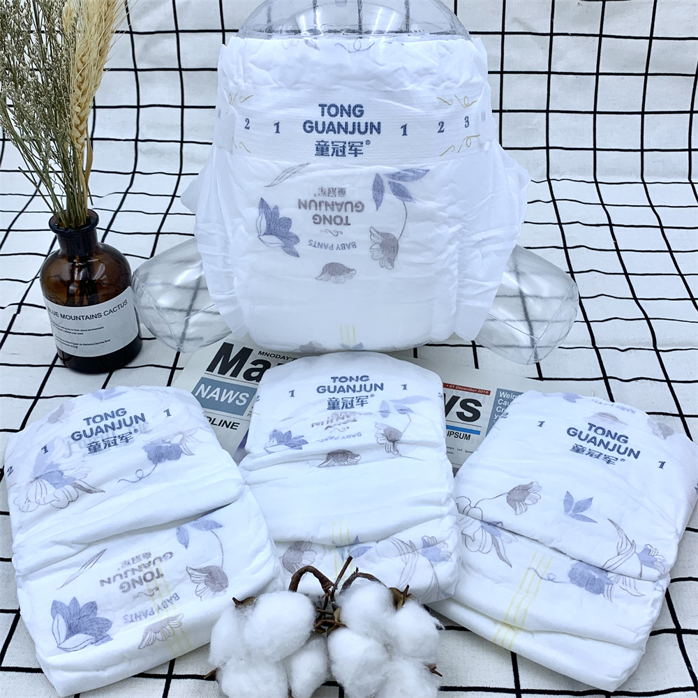 Comercio al por mayor de buena calidad impresas personalizadas de tela no tejida transpirable pañales para bebés