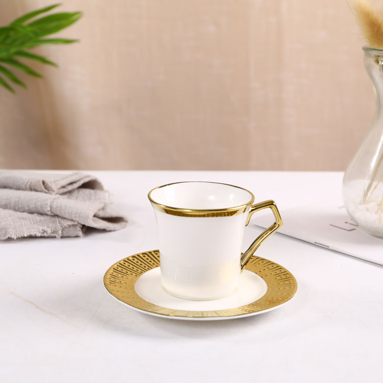 white gold rim coffee cup and saucer
