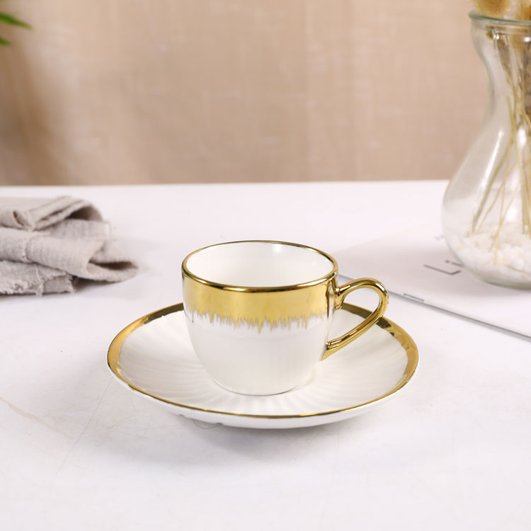 white gold rim coffee cup and saucer