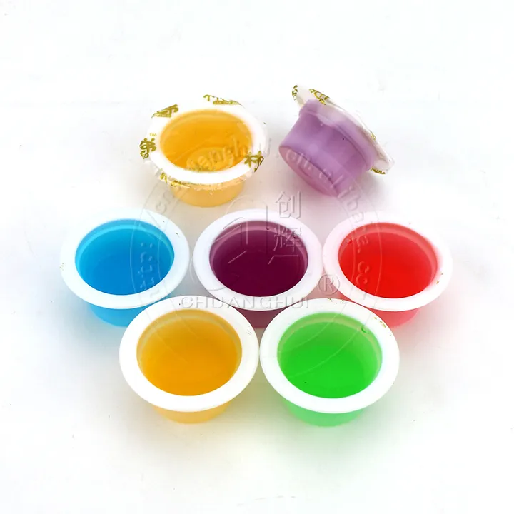 Tazas de mermelada de frutas coloridas taza de caramelo líquido de jarabe en caja