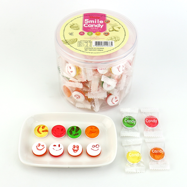 Supply 2-in-1 smile face fruit flavored hard candy with