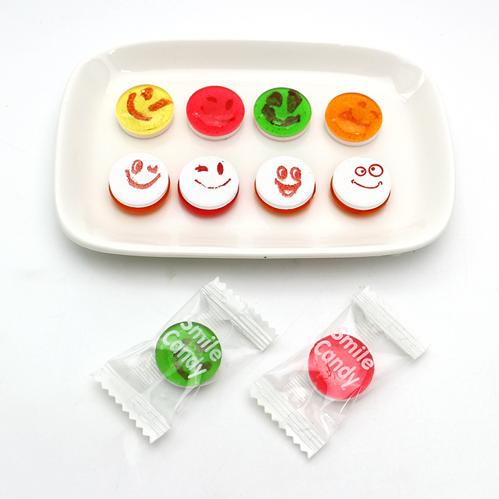 2-in-1 smile face fruit flavored hard candy with press tablet candy CH-Q116