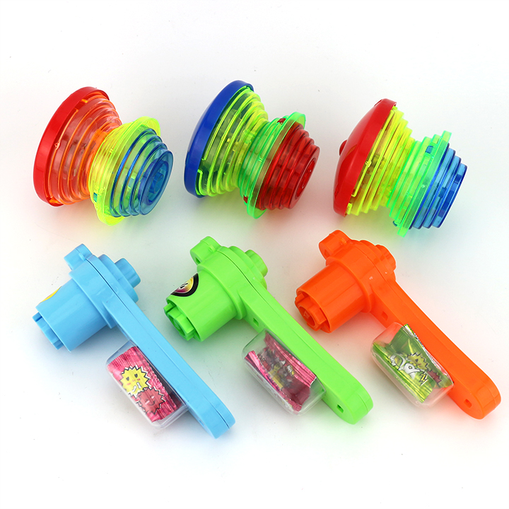 LED double flashing spinning top toy gyro launcher rotating toy candy with popping candy CH-TB221