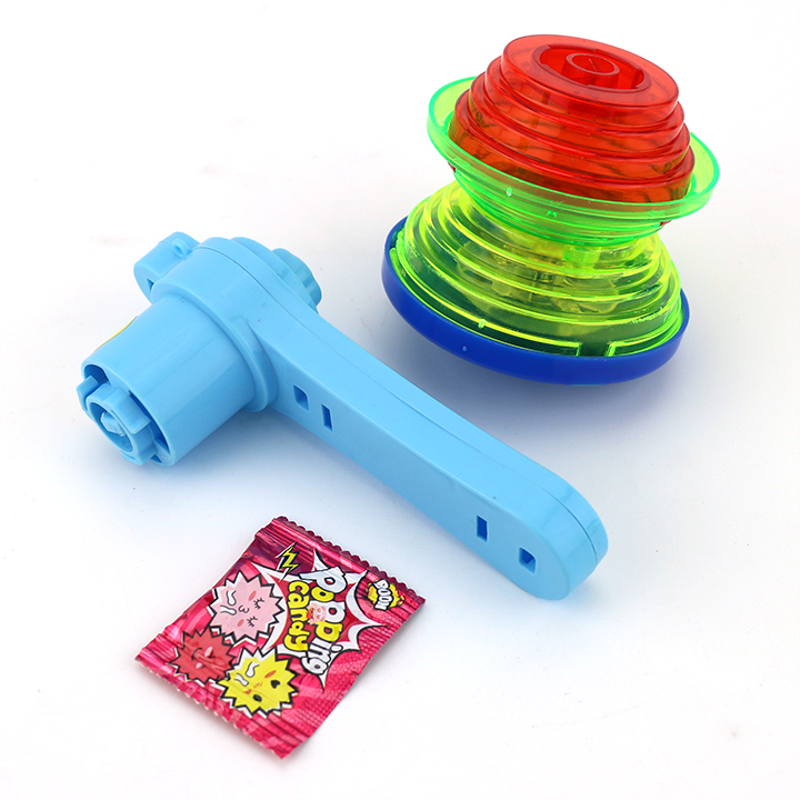 LED double flashing spinning top toy gyro launcher rotating toy candy with popping candy CH-TB221