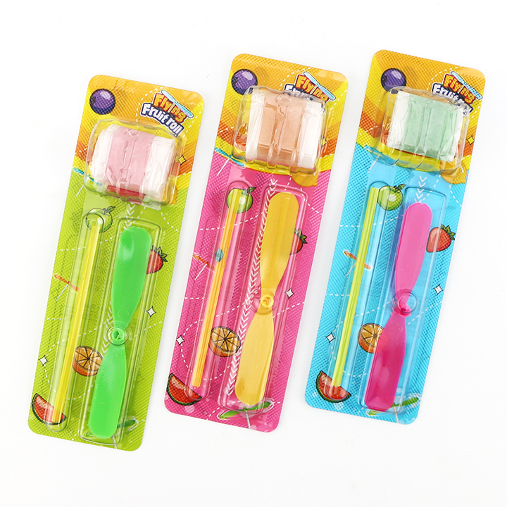Flying fruit roll gummy soft candy with Bamboo dragonfly rotating toy candy CH-T1265