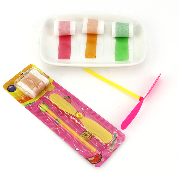 Flying fruit roll gummy soft candy with Bamboo dragonfly rotating toy candy CH-T1265