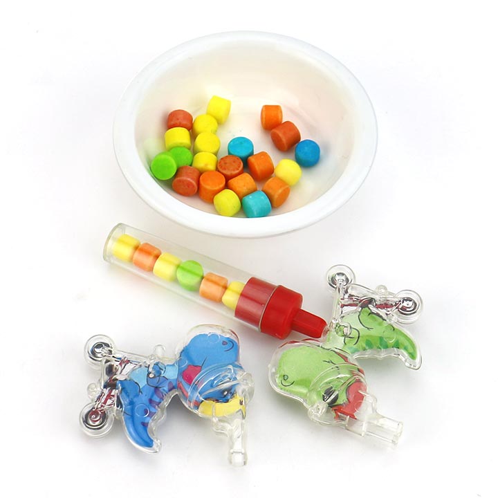 Cartoon dinosaur riding bicycles shaped whistle toy candy CH-T1271