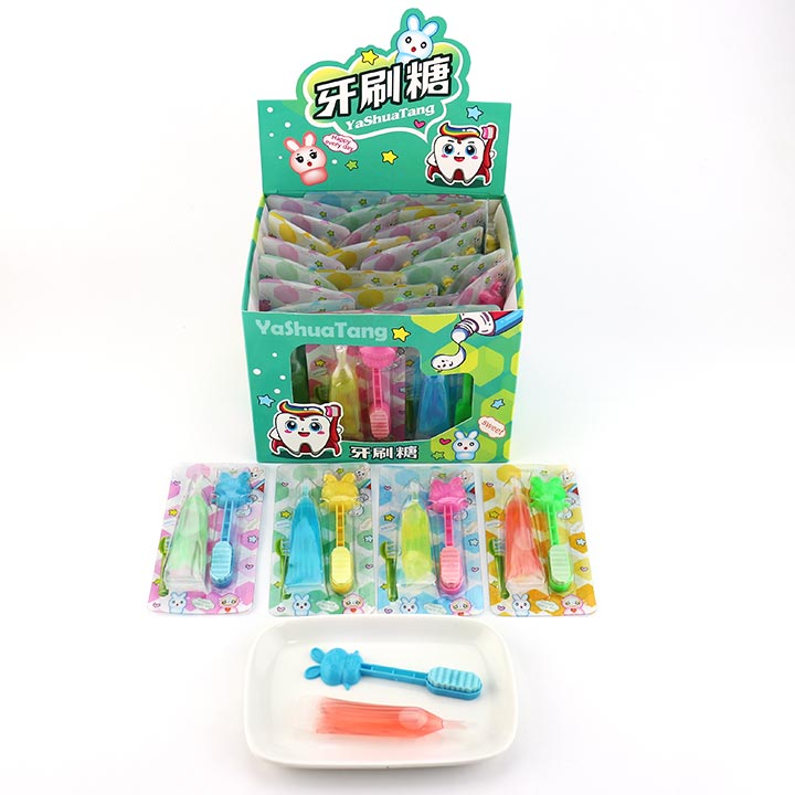 Cartoon toothbrush shaped pressed tablet candy with fruit flavored liquid jam CH-Z268