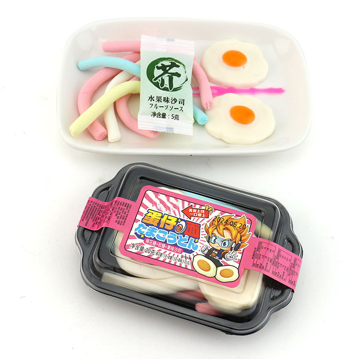 Noodle shaped marshmallow strips with fried egg shaped soft gummy candy and jam CH-M184
