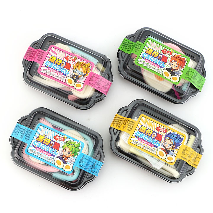 Noodle shaped marshmallow strips with fried egg shaped soft gummy candy and jam CH-M184