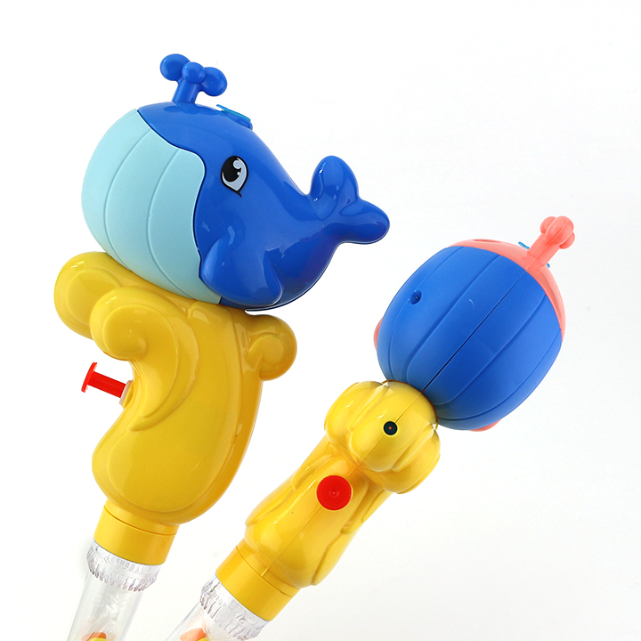 Cartoon humpback whale shaped water gun press spray water toy candy CH-TB236