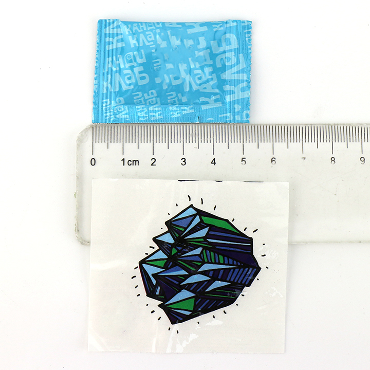 Halal 3-in-1 fruit flavored popping candy with tattoo stickers and fluorescent wristband CH-B389