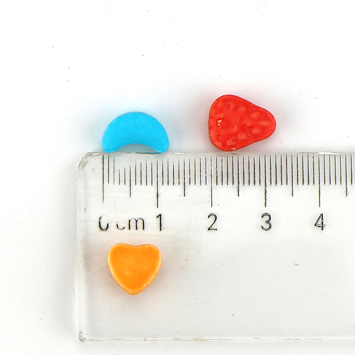 Colorful mixed fruit pressed tablet candy in Barrilin wine barrel CH-N768