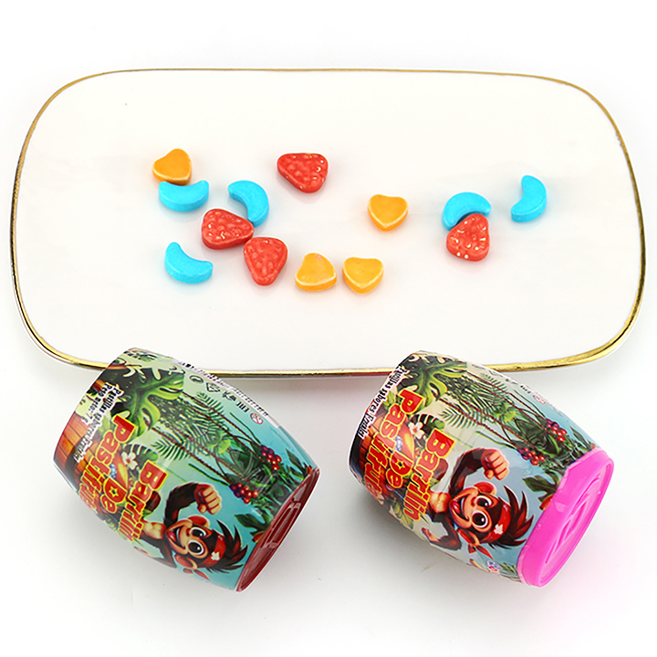 Colorful mixed fruit pressed tablet candy in Barrilin wine barrel CH-N768