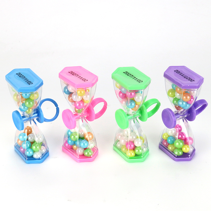 Time hourglass shaped finger spinning top toy with colored bead hard candy CH-T1447