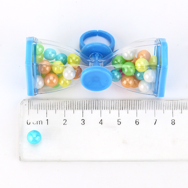 Time hourglass shaped finger spinning top toy with colored bead hard candy CH-T1447