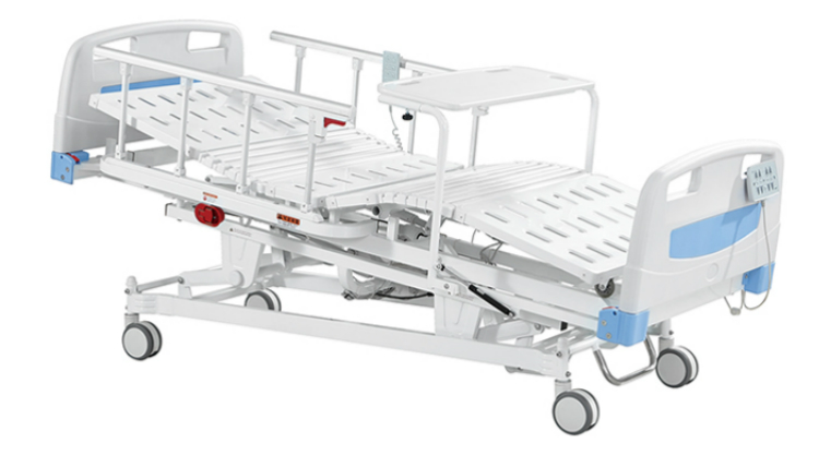 hospital bed with overbed table