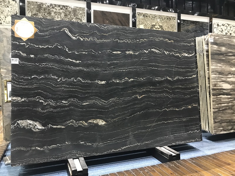 Gold pattern black luxury stone slab table supplier